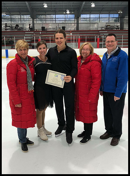 Caleb Rogers with judges and officials