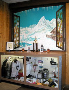 Mural of the open window and snow in the mountains