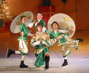 four skaters posing as Chinese people