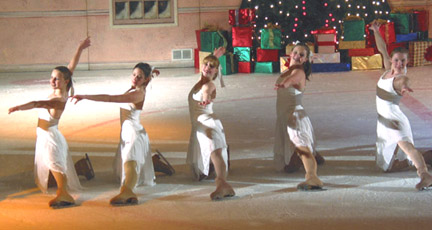 Several snowflake skaters on their knee in a row